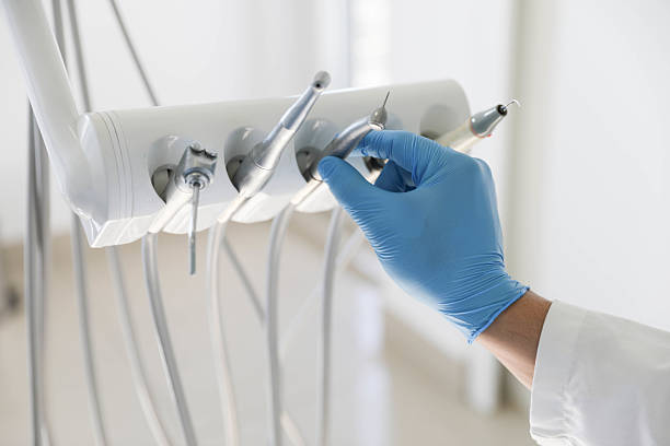Professional Emergency Dentist technician working in Ojus, FL
